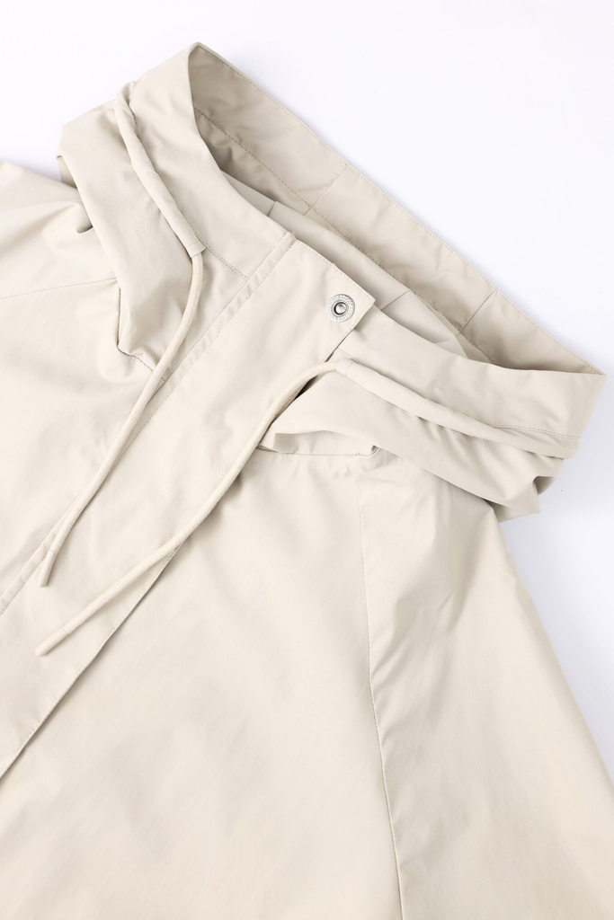 Embassy-of-bricks-and-logs-251-Lilli-Rainjacket-dark-sand-03-scaled.webp