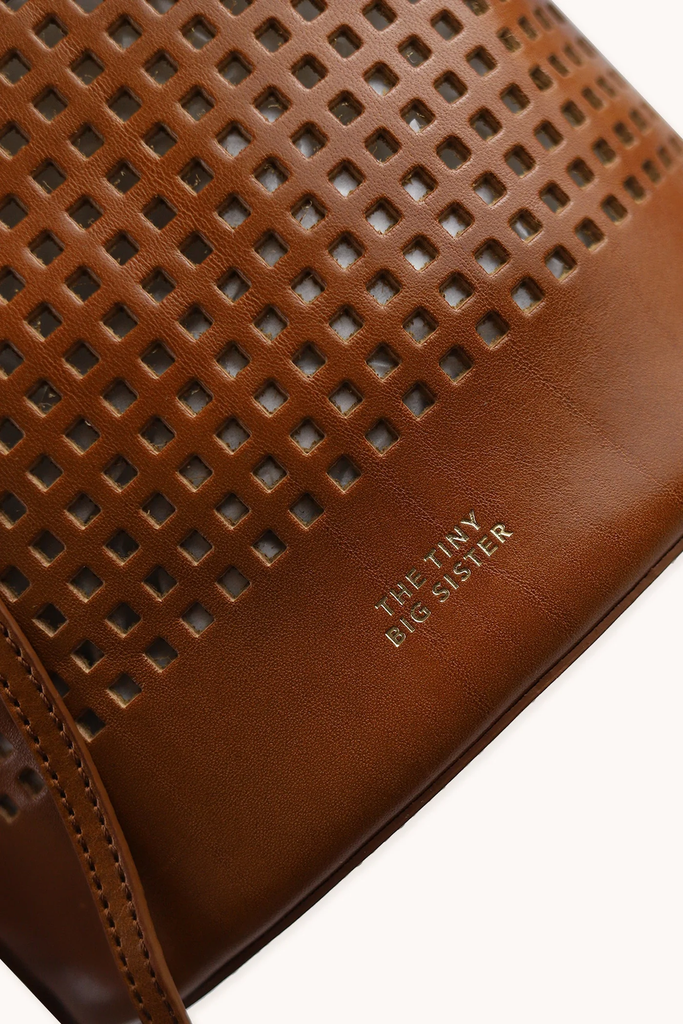 Tiny Big sister - Anne perforated leather small bucket bag - 1 - Babette Oostduinkerke